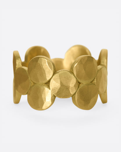 Ananda Khalsa Wide Dot band in matte yellow gold, a wide ring made of overlapping hammered gold discs