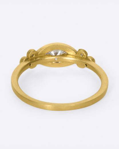 Yellow gold marquise diamond ring, back view of the band and the gallery under the diamond