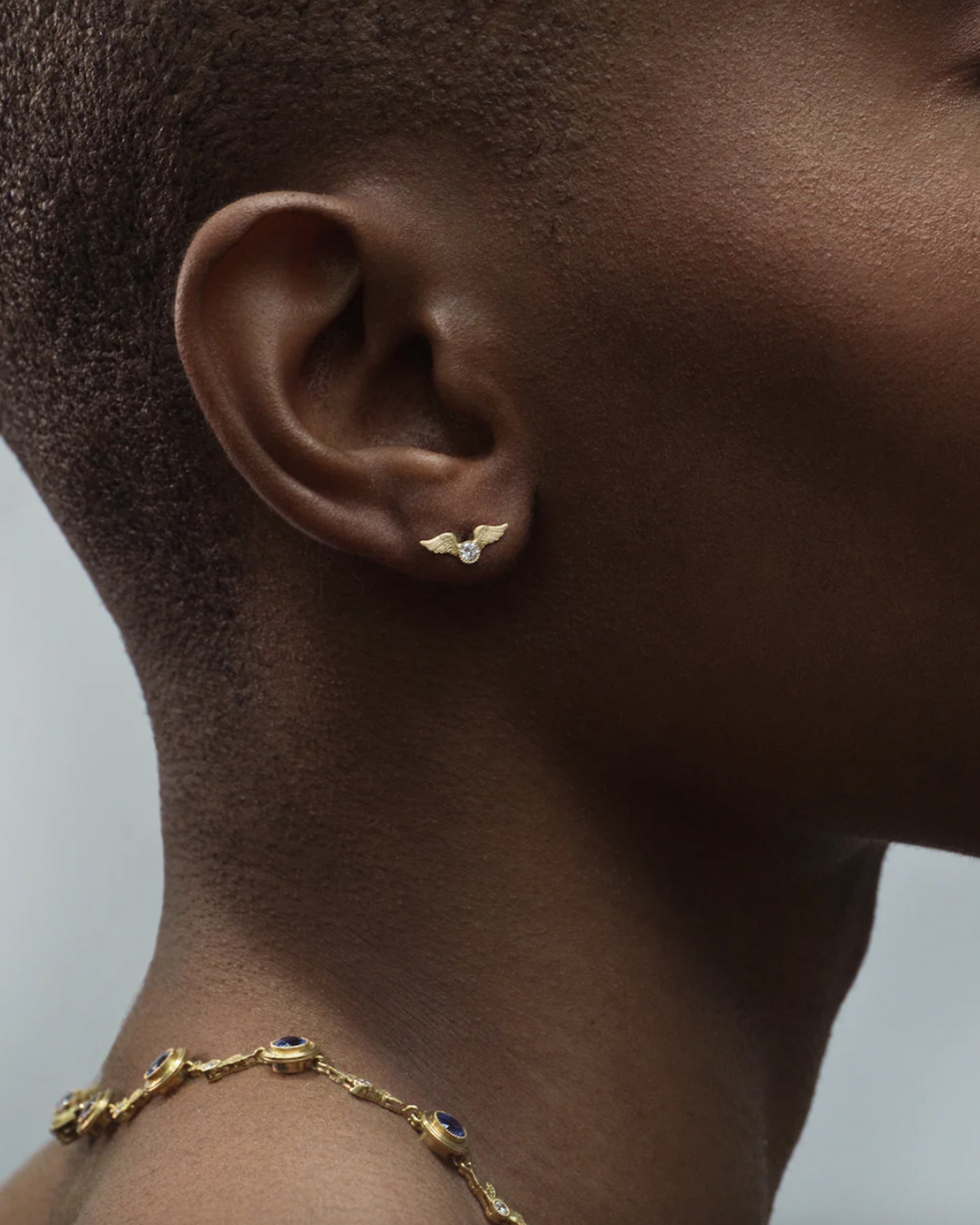 This little stud is inspired by the winged mountings and pavé wing pieces of late Victorian jewelry.