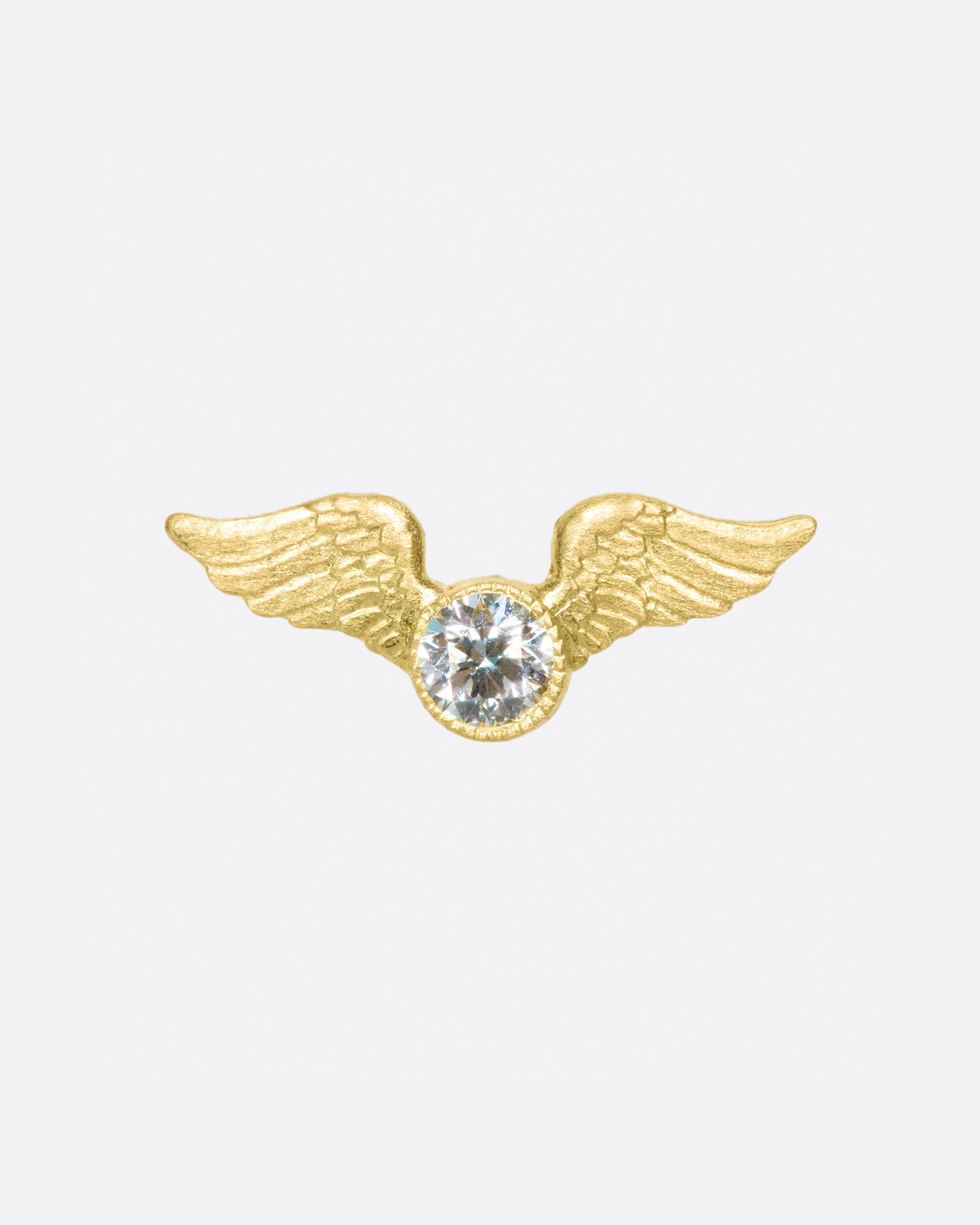 This little stud is inspired by the winged mountings and pavé wing pieces of late Victorian jewelry.