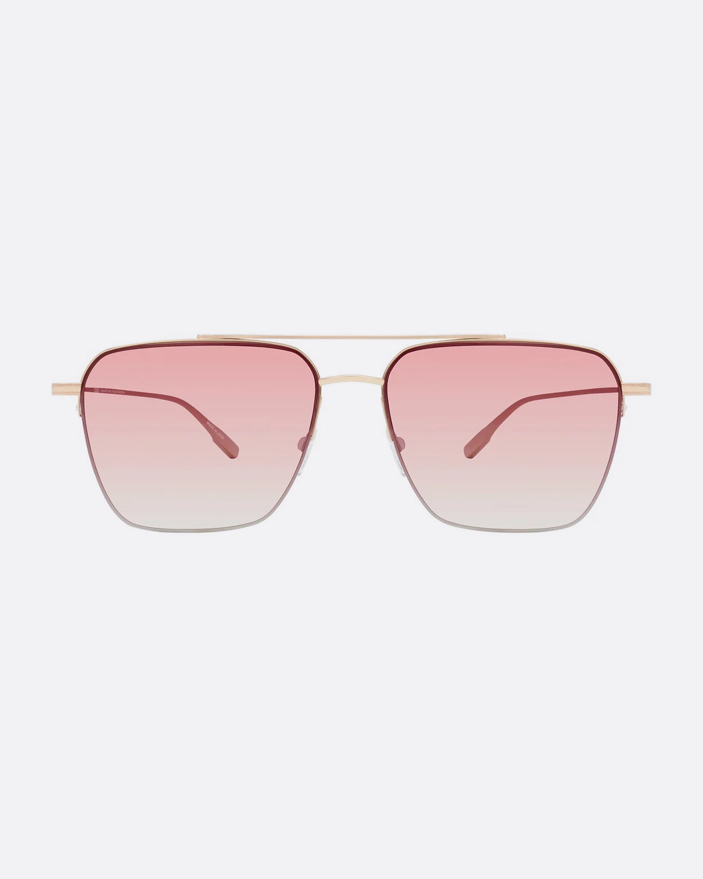 A pair of navigator sunglasses with pink gradient lenses. Shown from the front.