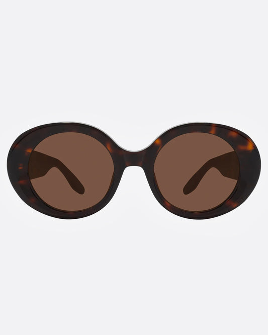 A pair of cat-eye sunglasses with tortoiseshell frame and brown lenses, shown from the front.