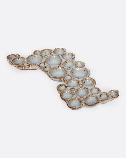 White ceramic bubble paint palette, angled view