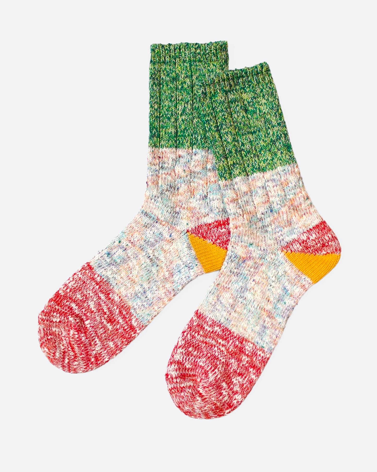 A pair of multicolored marl socks with dual-toned heels, shown from the side.