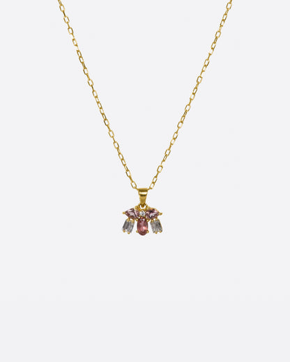 Yellow gold pink stone and diamond cluster necklace, front view of the pendant on its chain