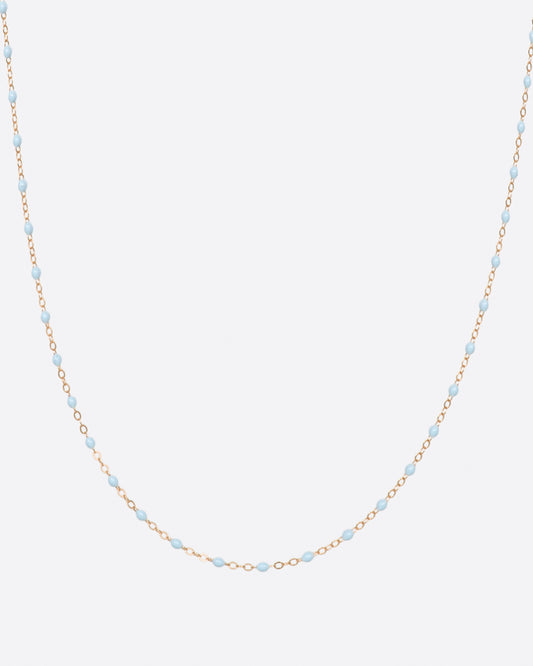Thin 18k gold chain necklace with resin beads. Each necklace is hand dipped in melted resin to create the beaded effect. 