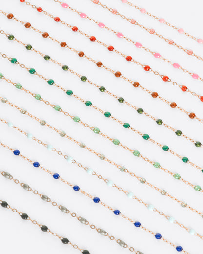 Rose gold resin bead bracelet, shown with bracelets in many resin colors