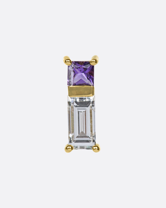 A play on color and geometry, this stud is made up of a princess cut amethyst and a baguette diamond.