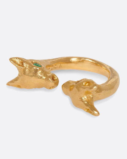 Yellow gold animal head ring with emerald eyes, top view from the other side showing the hand-textured gold
