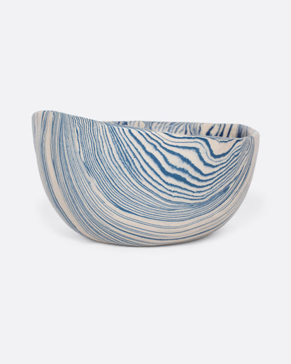 Blue and cream marbled ceramic bowl, side view