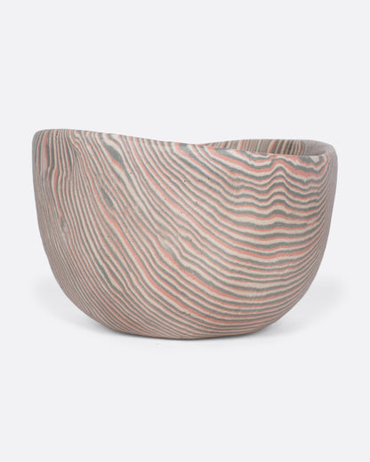 Pink and gray marbled ceramic bowl, side view