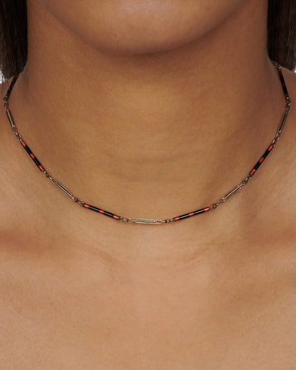 Vintage white gold and enamel bar link necklace worn close to the neck
