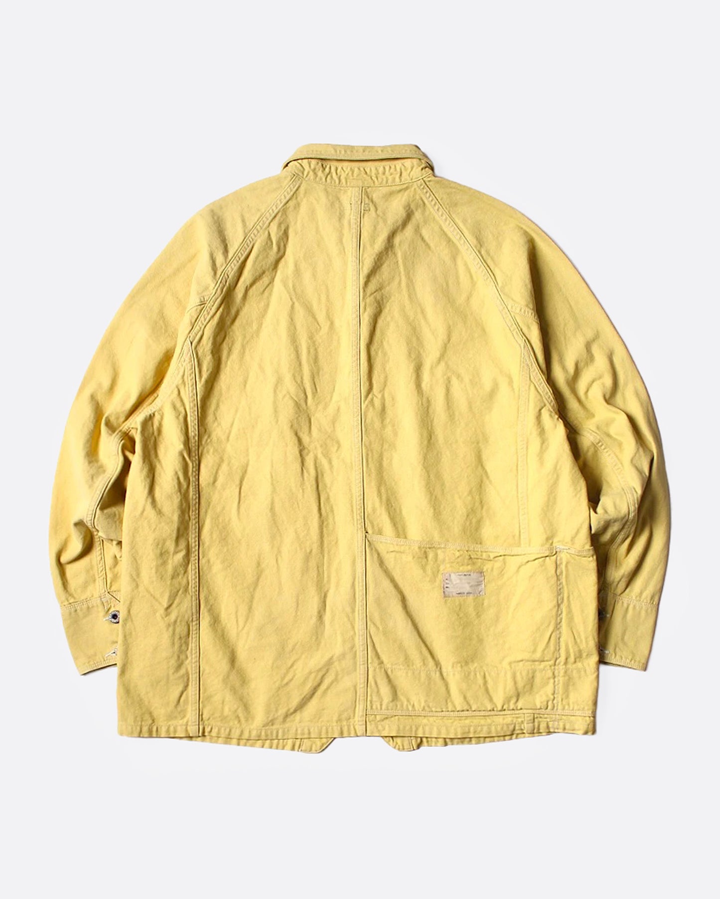 A yellow canvas chore coat, shown from the back.