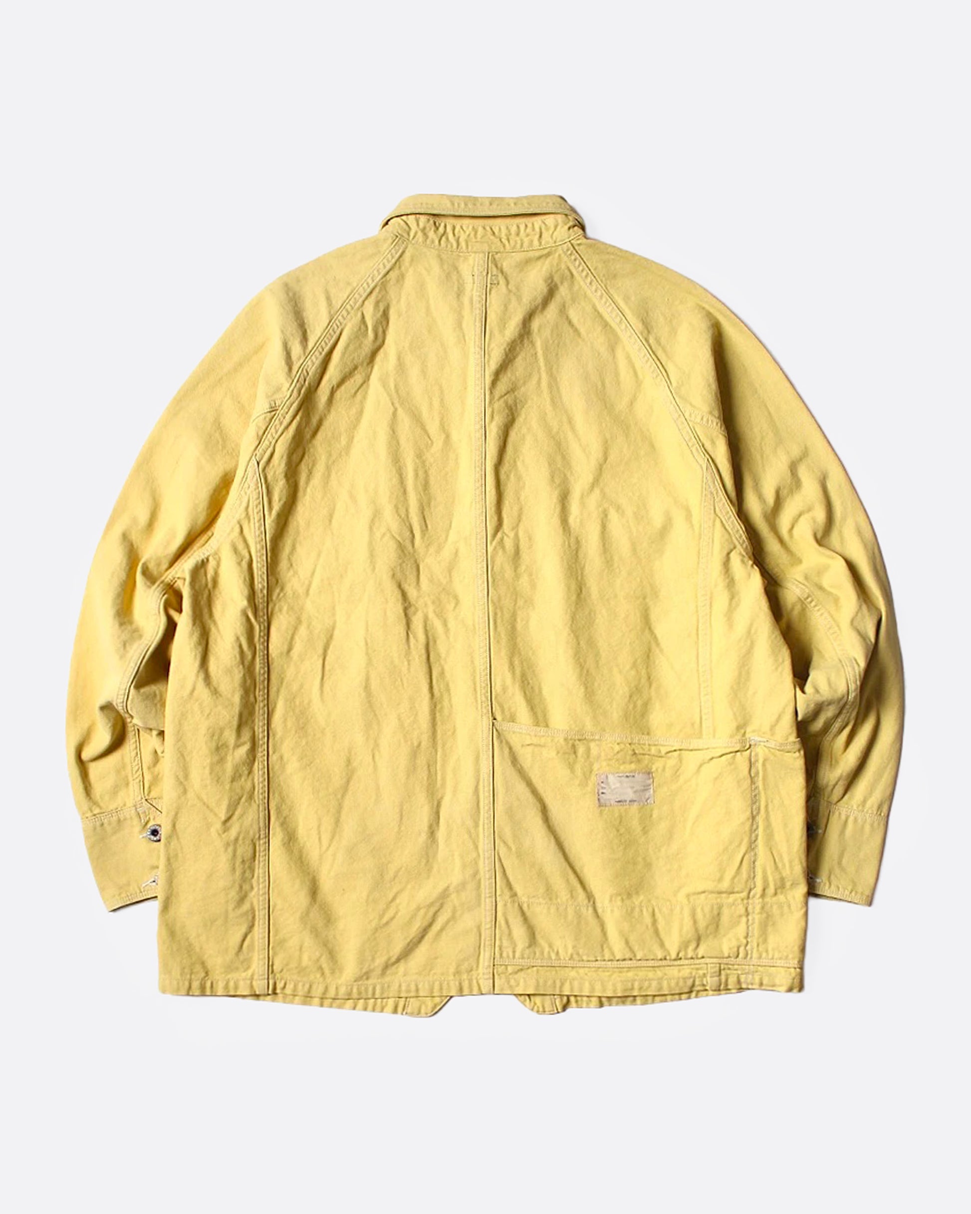 A yellow canvas chore coat, shown from the back.