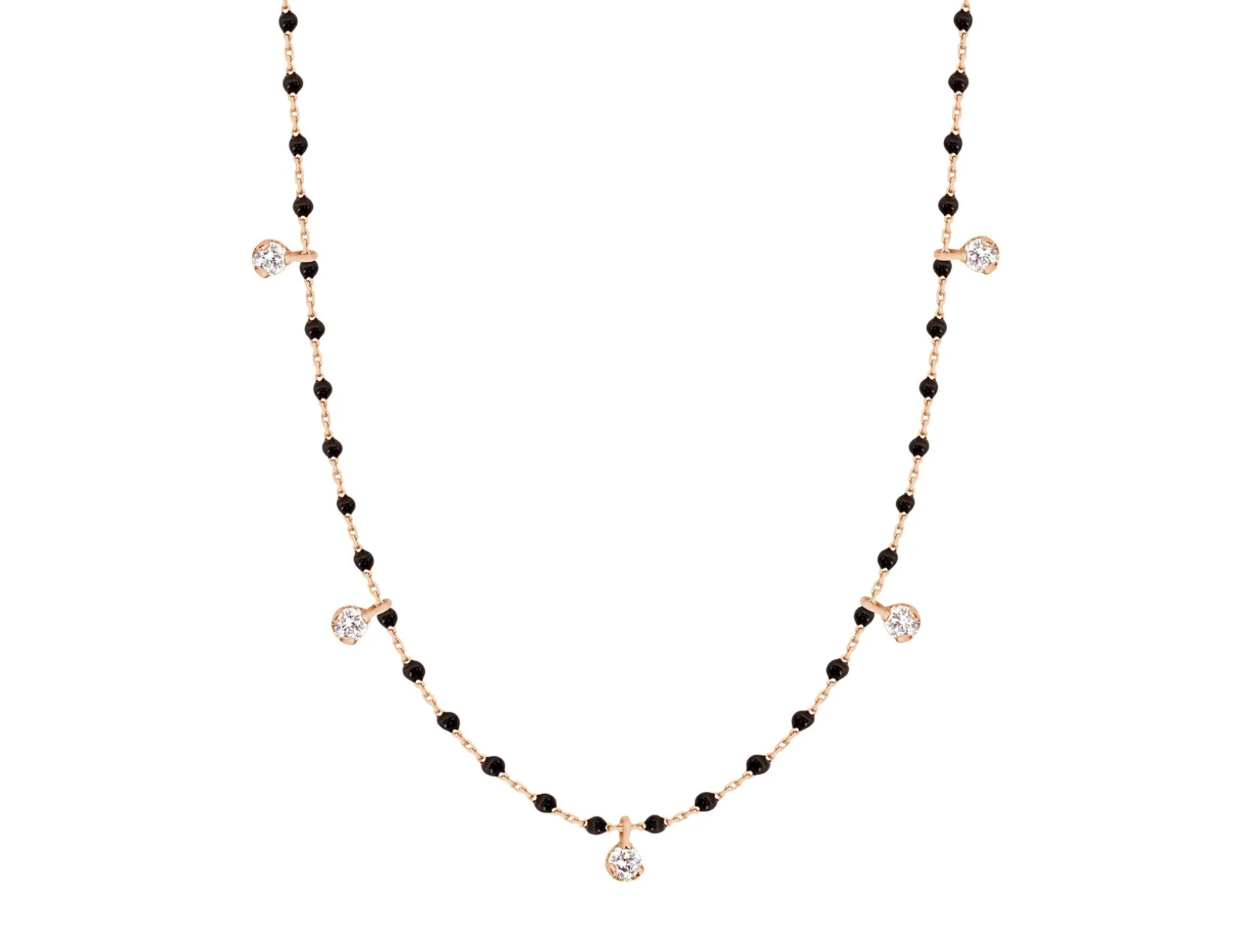 A rose gold cable chain necklace with droplets of black resin and five diamond charms. Shown from the front.
