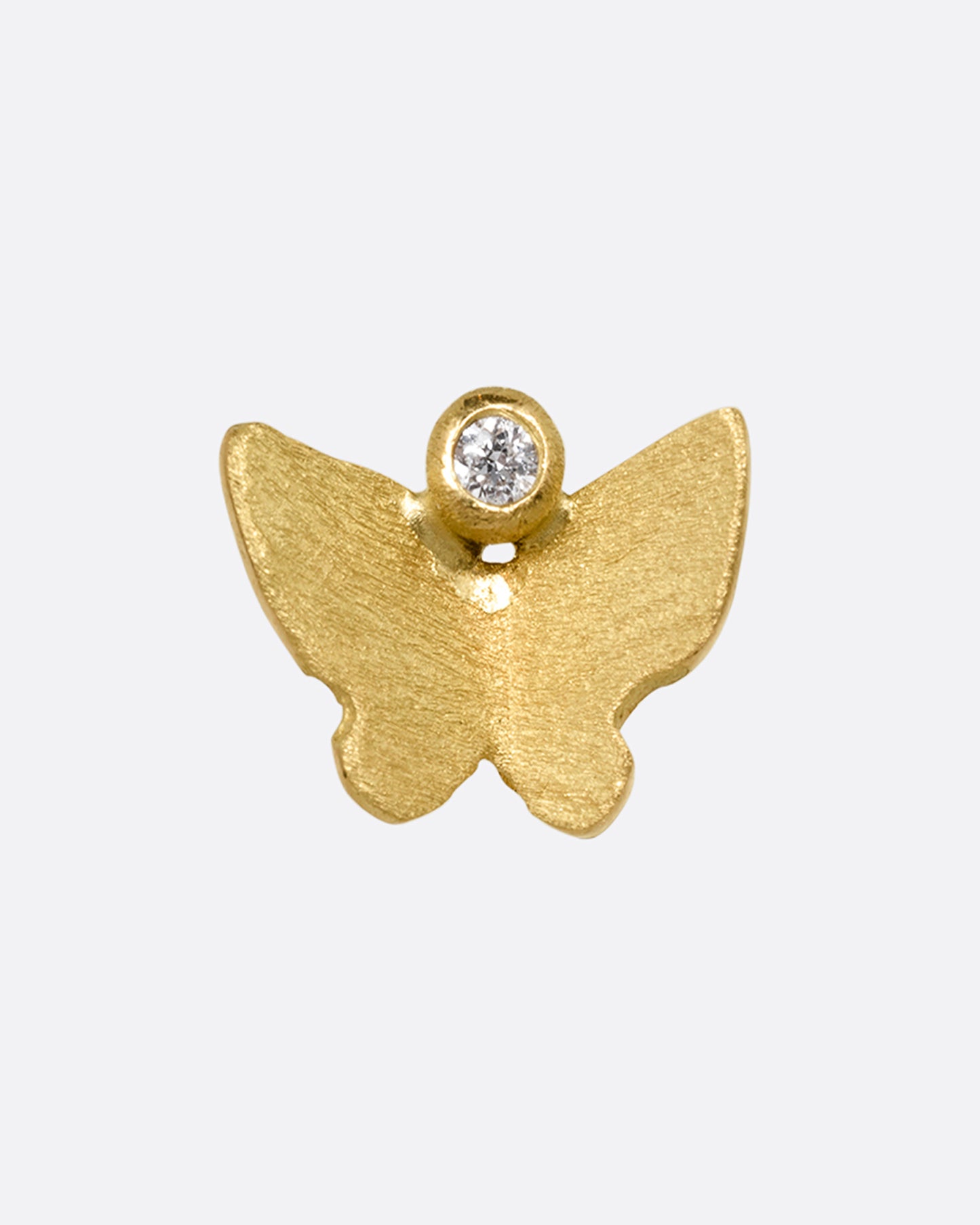 A yellow gold butterfly earring with a single diamond. Shown from the front.