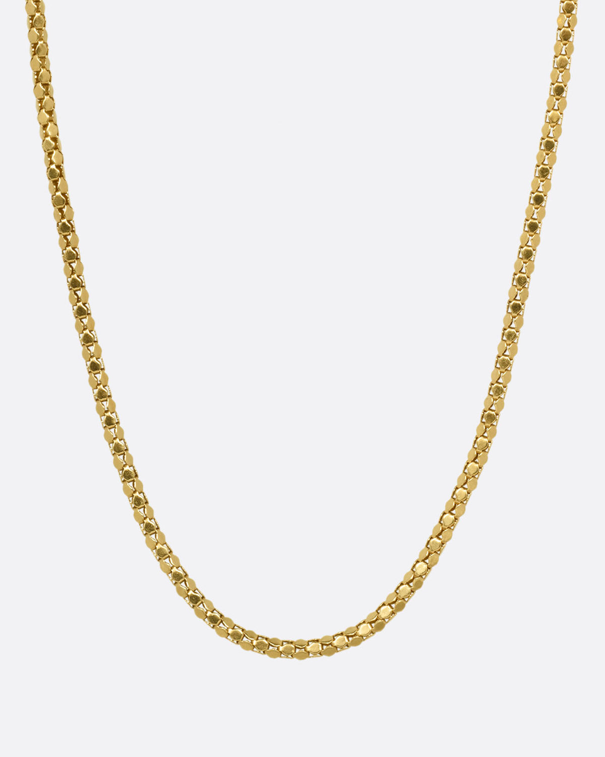 A yellow gold tube chain necklace, shown from the front.