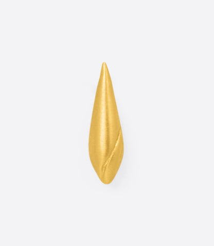 Yellow gold shell stud earrings, close view of one stud