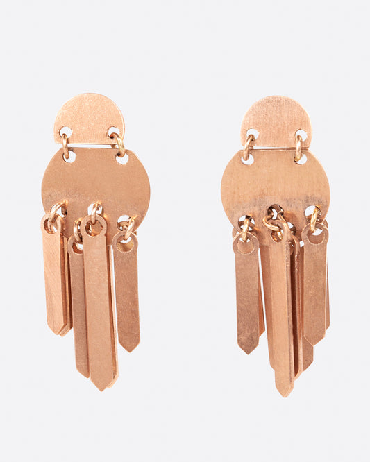 A pair of rose gold fringe earrings with two stacked circular tops. Shown from the front.