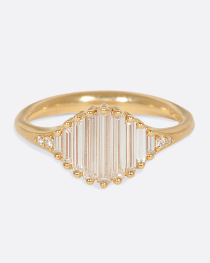 A signet ring with a face made entirely of baguette diamonds. Shown from the front.