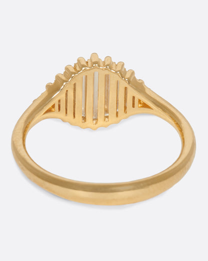 A signet ring with a face made entirely of baguette diamonds. Shown from the back.