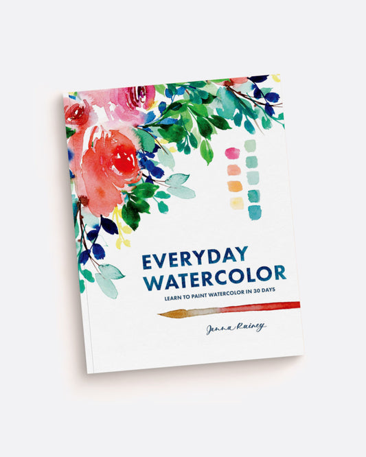 A watercolor book, "Everyday Watercolor, Learn to paint watercolor in 30 days", by Jenna Rainey. The cover has watercolor painted flowers and a paintbrush. Shown from the front. 