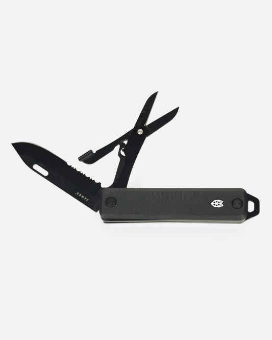 An all black pocket knife with a scissor attachment, shown open from the side.