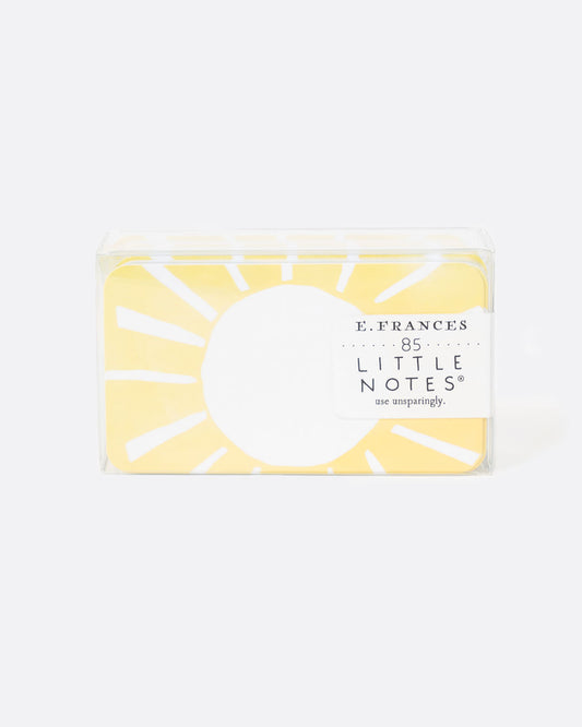 A notecard set with a sun motif. Shown from the front.