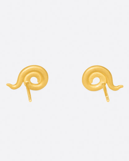 Yellow gold coil stud earrings, the pair from the side showing the posts
