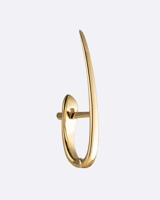 A yellow gold click hoop with an elongated pointed top. Shown from the side.