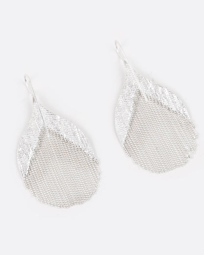 Silver strand teardrop earrings, the pair laid flat