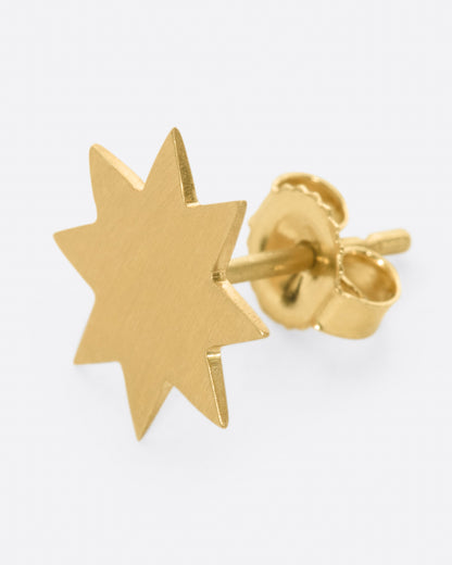 Yellow gold star stud earring, side view showing the post and back