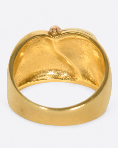 A wide, dimpled yellow gold band with white and rose gold teardrop accents. Shown from the back.